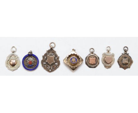 Seven various silver fobs, including the Rotary International, 64gm