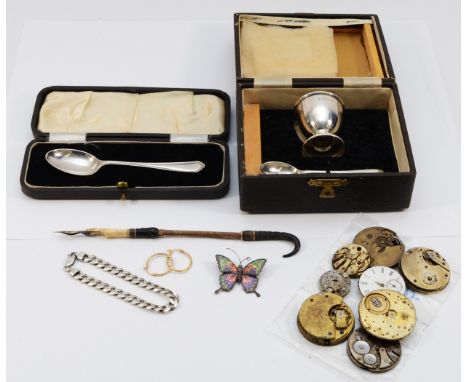 A silver egg cup and spoon, Birmingham 1939/Sheffield 1939, case, a silver christening spoon, case, a silver bracelet, a pair