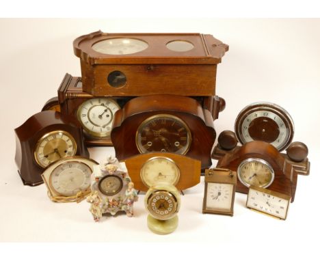 A collection of mid 20th century and later mantel clocks, having manual and quartz movements in two boxes. (2)