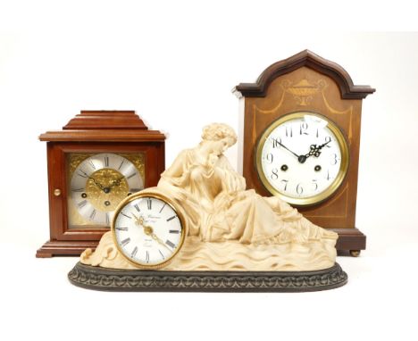 Three mantel clocks, to include, an Edwardian mahogany mantel clock, with a porcelain dial featuring Arabic Numerals and a Ge