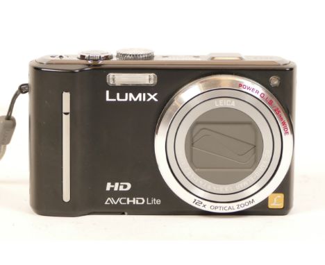 A Panasonic Lumix TZ-10 compact digital camera, with box