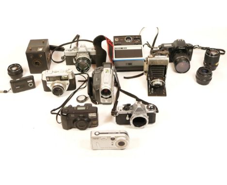 A Collection of Cameras, including Minolta SRT-101 with  f/1.4 lens, a Pentax SMC-A 28mm f/2.8 lens, a Pentax ME Super with 1