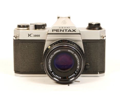 A Pentax K1000 SLR camera with 50mm f/2 Pentax lens
