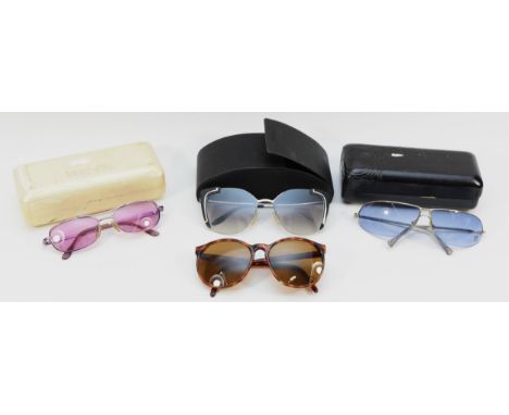 Four pairs of designer sunglasses, to include, Vuarnet, 2409, Versace, N27 26M 421, cased, Versus Versace, L17 44M, cased, Pr