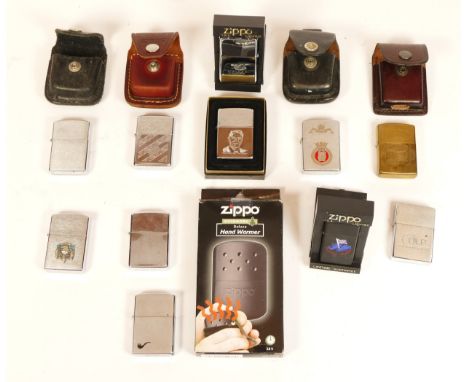 Zippo U.S.A; A collection of eleven Zippo cigarette lighters, cased with leather belt holder pouches and a Zippo hand warmer.