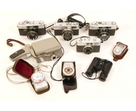 Cameras including a Yashica 72-E half frame, Three Minolta A-5 cameras of different types, an Ambassador movie camera