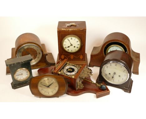 A collection of mid 20th century and later mantel clocks, having manual and quartz movements in two boxes. (2)