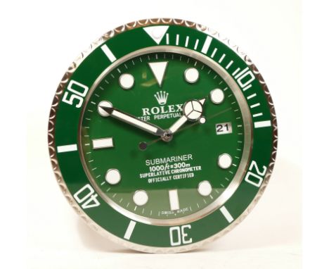 A 'Rolex' style advertising wall clock, green dial reads 'Rolex Oyster Perpetual Submariner' having quartz movement, 34cm dia