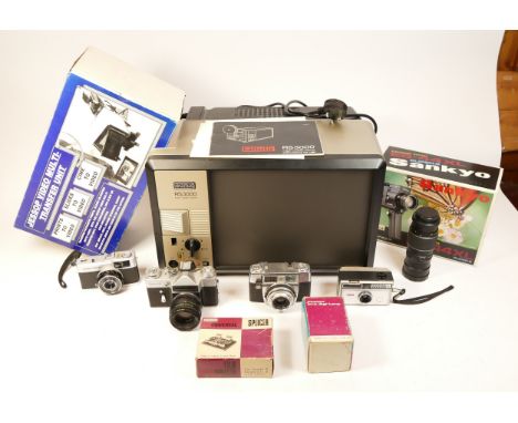 A collection of cameras and accessories, to include an Olympus Trip 35, a Zenit-E camera, a Eumig RS 3000 projector, cased vi