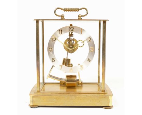A 1960s Kundo 'Electronic' skeleton mantel clock with Arabic numerals and baton indices (Atmos-style) 22cm tall.