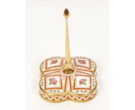 A Royal Crown Derby ceramic ring holder, in the pattern Honeysuckle.