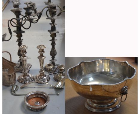 A small quantity of silver plated items to include a Barker Ellis bottle caddy with pierced sides, a punch bowl and ladle, a 