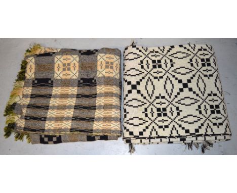 Two vintage 100% Welsh wool tapestry throws, with geometric patterns one in ivory and white palette and one in lavender, blac