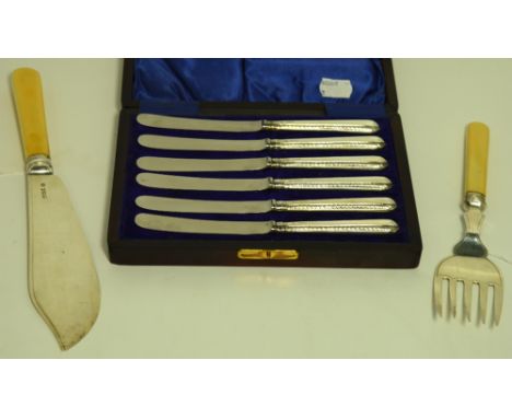 A George V hallmarked silver fish serving knife and fork set, Sheffield 1911, length 30cm and a cased set of George V hallmar