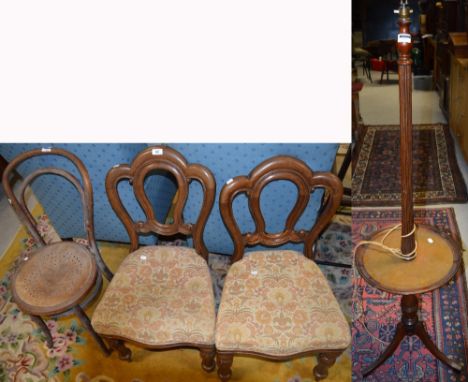 A pair of Victorian mahogany curved back dining chairs on turned legs, upholstered in tapestry style fabric, a vintage bentwo