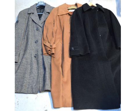 A vintage lady's Jaeger cashmere full length coat, a similar Ravens lady's black coat and a gentleman's Gannex check pattern 
