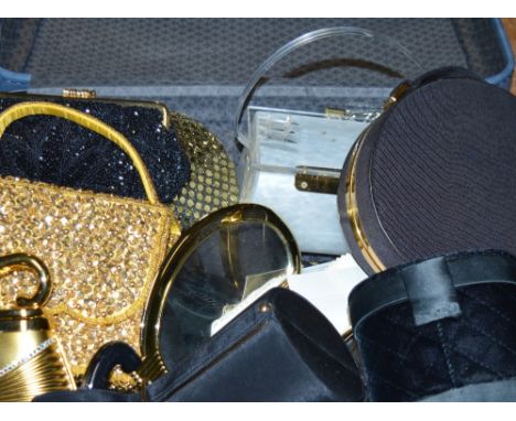 A suitcase containing a small quantity of photograph frames, vintage mirrors, sequinned evening bag, a vintage grosgrain roun