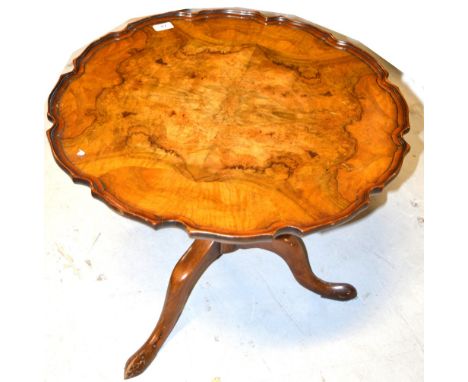 A 20th century walnut tilt top occasional table with shaped dish top on tripod support, diameter 60cm.