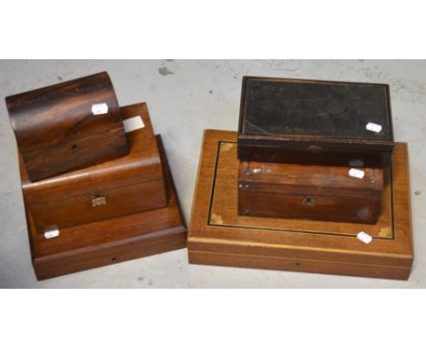 Two 19th century jewellery boxes, a 19th century rosewood tea caddy with domed top, two vacant canteens for cutlery and a fur