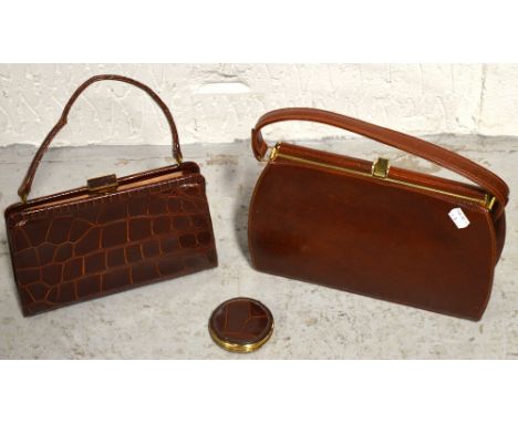 A vintage lady's crocodile effect handbag with a matching compact and a further lady's handbag (3).