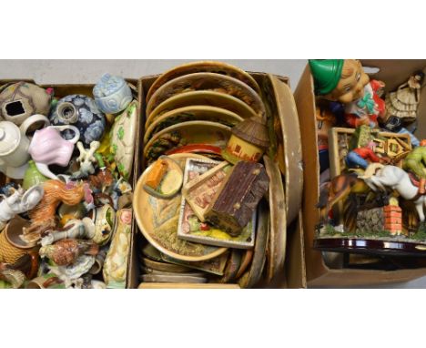 A quantity of decorative ceramics to include ceramic models of animals, decorative plaster wall plaques, a resin Juliana Coll