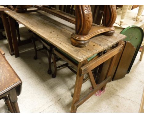 A trestle type table, a three part dressing table mirror, a Corinthian 215 pinball game, a brass standard lamp and a black an