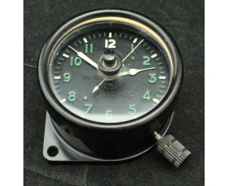 An Air Ministry clock, inscribed "8 day MK2D-6A/1275-20110/43", with Air Ministry crown stamp verso (of the type used in both