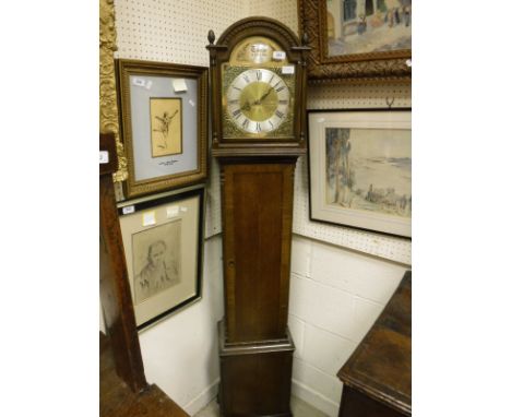 A modern oak cased long case clock of small proportions, the German musical movement with brass arched dial inscribed "Thorpe