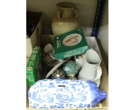 A box containing assorted china and glassware to include Goebel wildlife plates, various glass paperweights, a Portmeirion ju