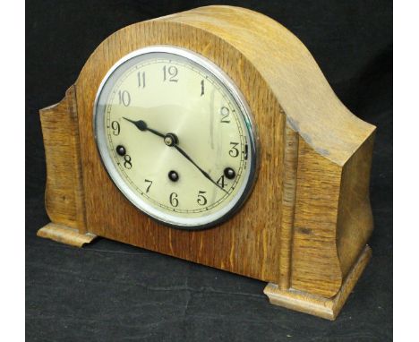 An oak cased mantle clock and an Art Deco style oak cased barometer thermometer