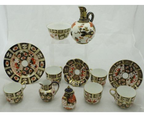 A collection of Royal Crown Derby Japan pattern wares, to include five cups and saucers, miniature cream jug, pear shaped pot