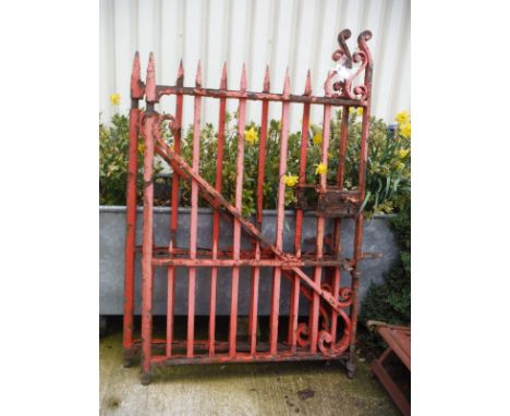 A pair of Victorian red painted iron gates   CONDITION REPORTS   Gate height approx 153 cm to top of spikes.  Each gate width
