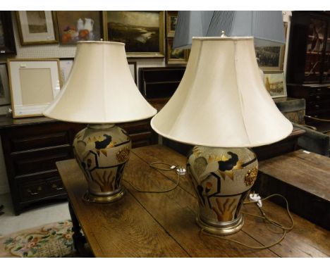 Pair of modern table lamps with cream shades. CONDITION REPORTS Approximate height 75 cm total.  Both have general wear and t