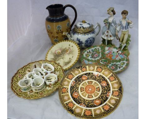 A Chinese blue and white and gilt decorated teapot, a famille rose plate, a Doulton "Marguerite" pattern jug, two porcelain f