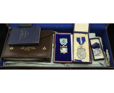A Masonic Regalia case bearing initials "J.B.", pertaining to "Brother J Bambridge of Home County Lodge, No. 3451", containin
