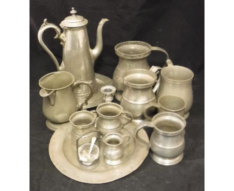 A box of various pewter wares to include various 19th Century and other mugs and measures (9), a pewter based glass open salt