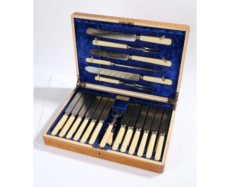 A Good cased set of table and carving knives by Harrison Brothers Sheffield, consisting of three carving knives, two carving 