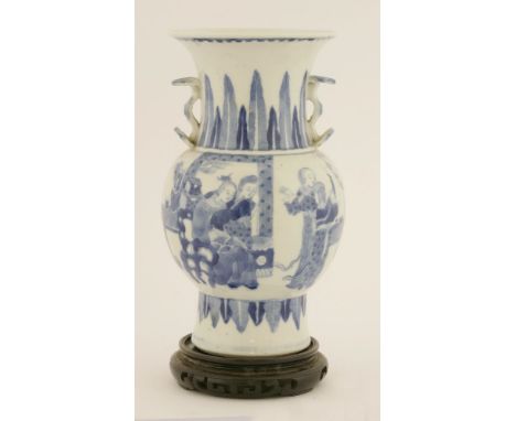 A Chinese blue and white vase,late Qing dynasty, of baluster form painted with a couple seated in an interior setting with a 