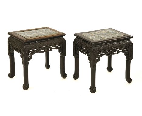 Two Chinese vase stands,late 19th century, carved with scrolling lotus above pierced key fret with ruyi ends, on square legs 