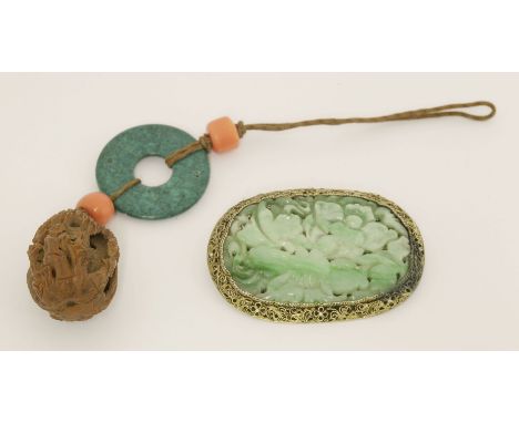 A Chinese jade brooch, carved and pierced with leafy flowers, 4.3cm, mounted with filigree work, and a walnut carving, with t