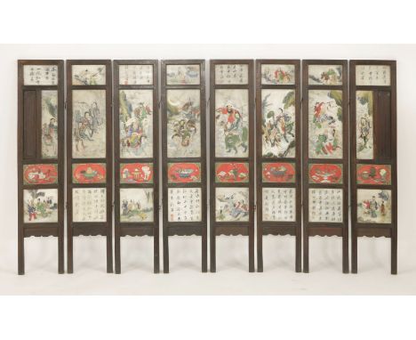 A Chinese eight-fold screen,early 20th century, with hardstone insert panels, possibly jade, one painted with Liu Hai, Shoula