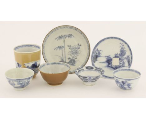 Two sets of Nanking Cargo blue and white tea cups and saucers, c.1750, one cup painted with a pavilion in a watery landscape,
