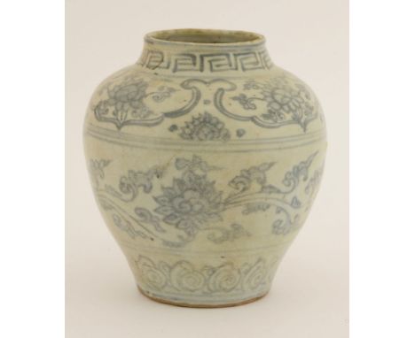 A Chinese blue and white jar, mid 16th century, painted with scrolling lotus between ruyi head and scroll borders, 16cm