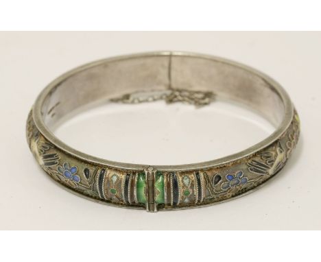 A Chinese silver hinged bangle,1930s, enamelled with magpies standing on a blossoming prunus branch, stamped 'MADE IN CHINA, 