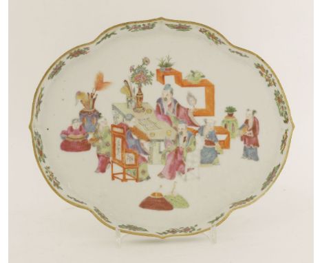 A Chinese famille rose tray,late 19th century, of shaped quatrefoil form, painted with three literati seated by a desk studyi