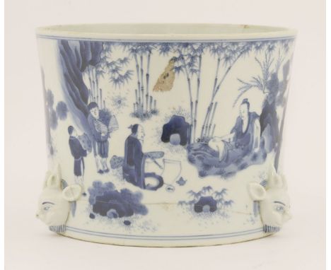 A blue and white brush pot, painted with scholars drinking while playing weiqi, practising calligraphy and other leisure purs