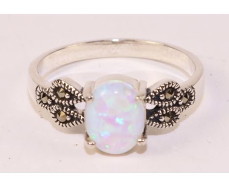 Opal and marcasite silver ring stamped 925   Condition Report   Click here for further images, condition, auction times & del