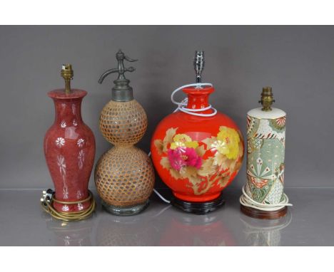 Three second half 20th century pottery lamp bases and a vintage glass soda syphon, double gourd syphon is 55cm high (4)