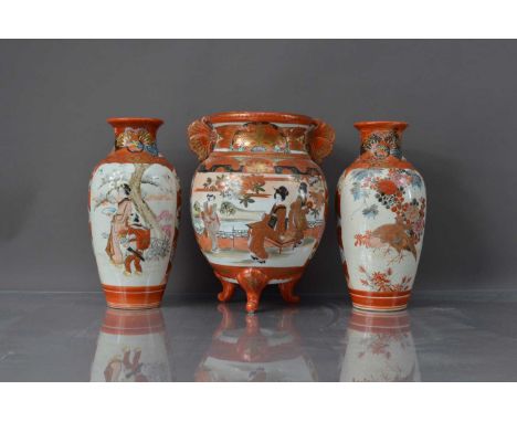 A pair of c1930s Japanese Kutani porcelain vases and a similar twin handled pot, 26cm high, pot lacks cover, both with crazin