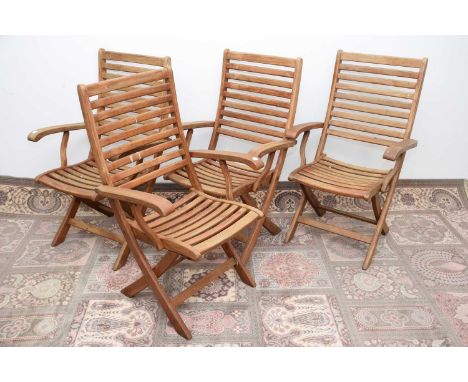 Four modern teak garden chairs, folding with button release, one with damaged slat to back and various wear and bird poo (4)